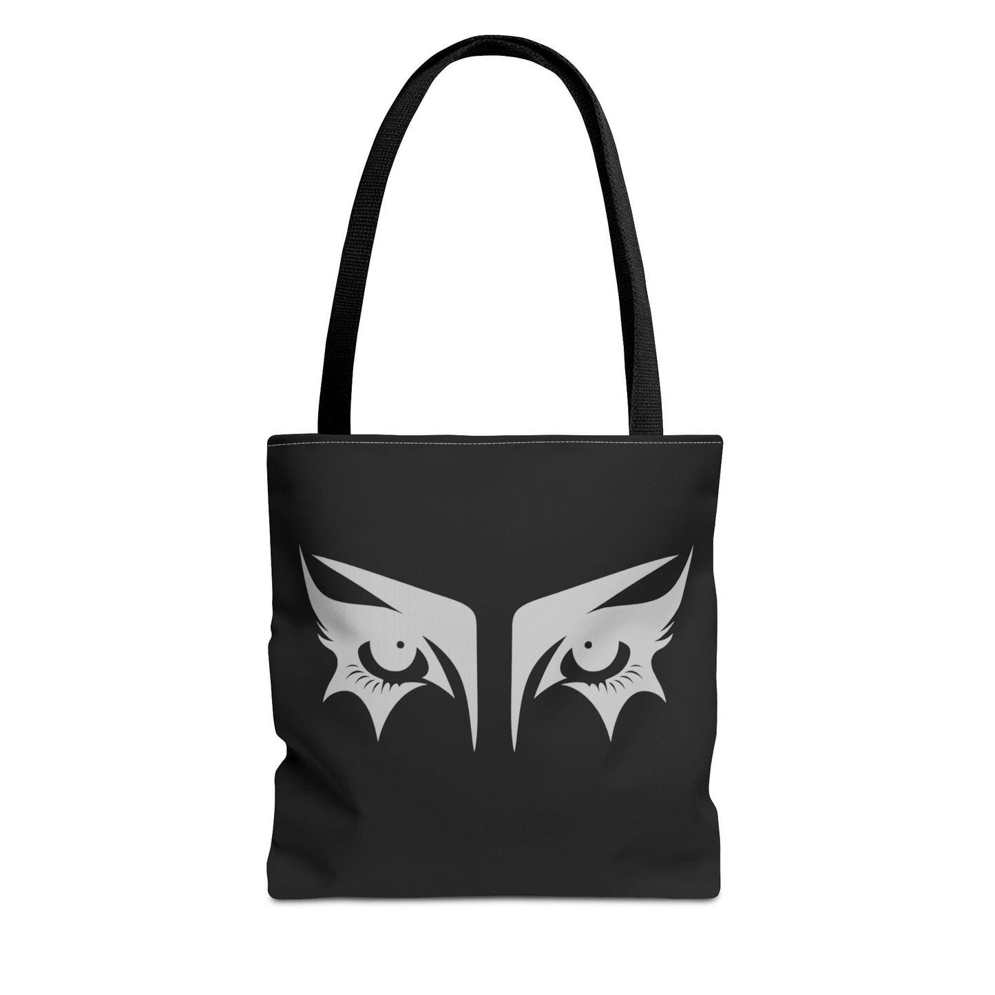 A gothic tote bag that has an illustration of trad goth makeup against a black background.