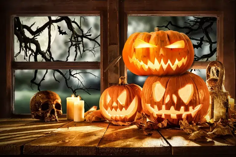 25 Spooky Halloween Candles & Holders to Haunt Your Home