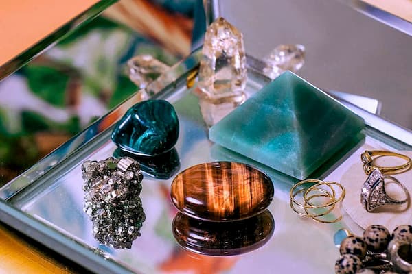 Crystals for money and crystals for good luck: pyrite, malachite, jade, quartz, and tiger's eye.