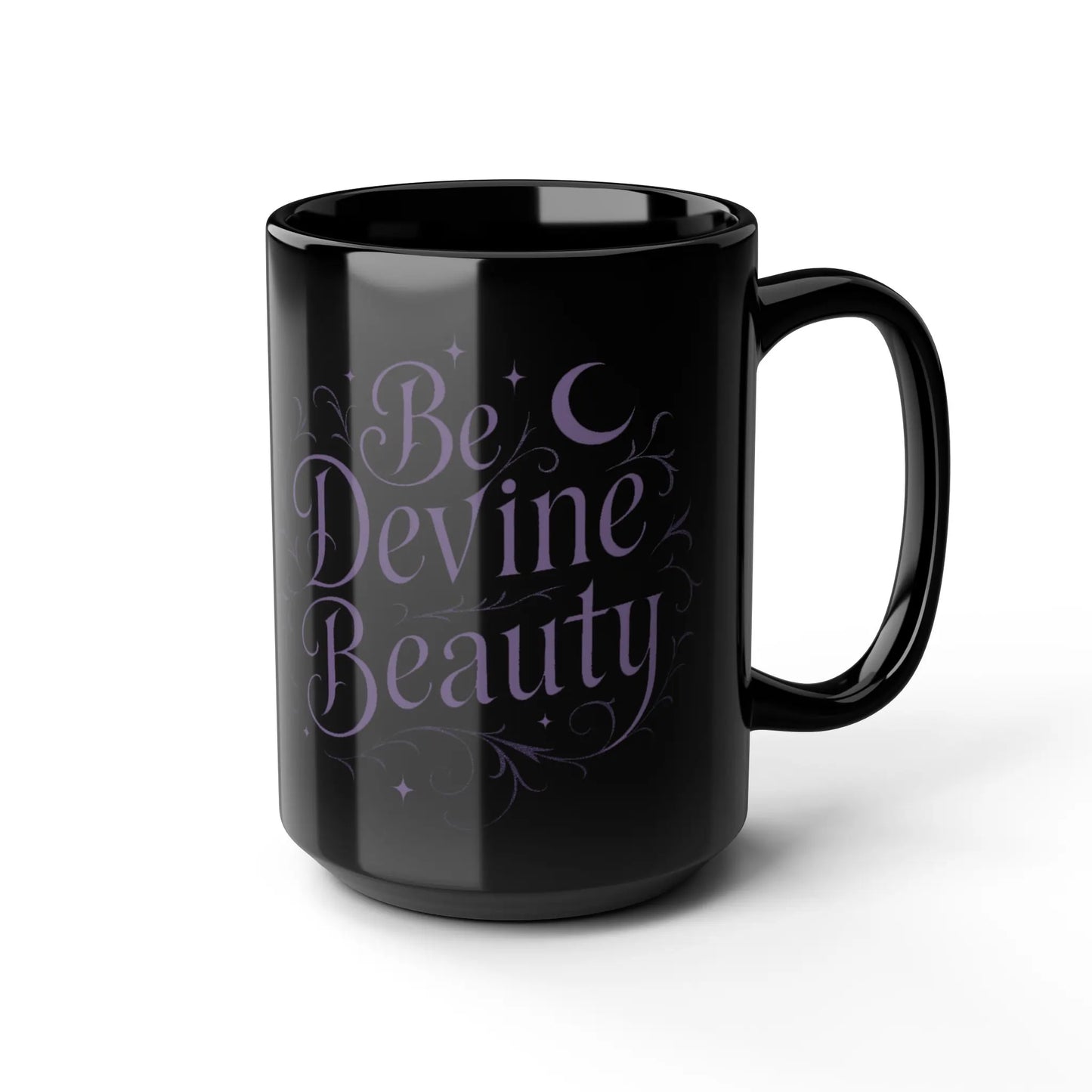 Black mug with 'Be Devine Beauty' text on a white background