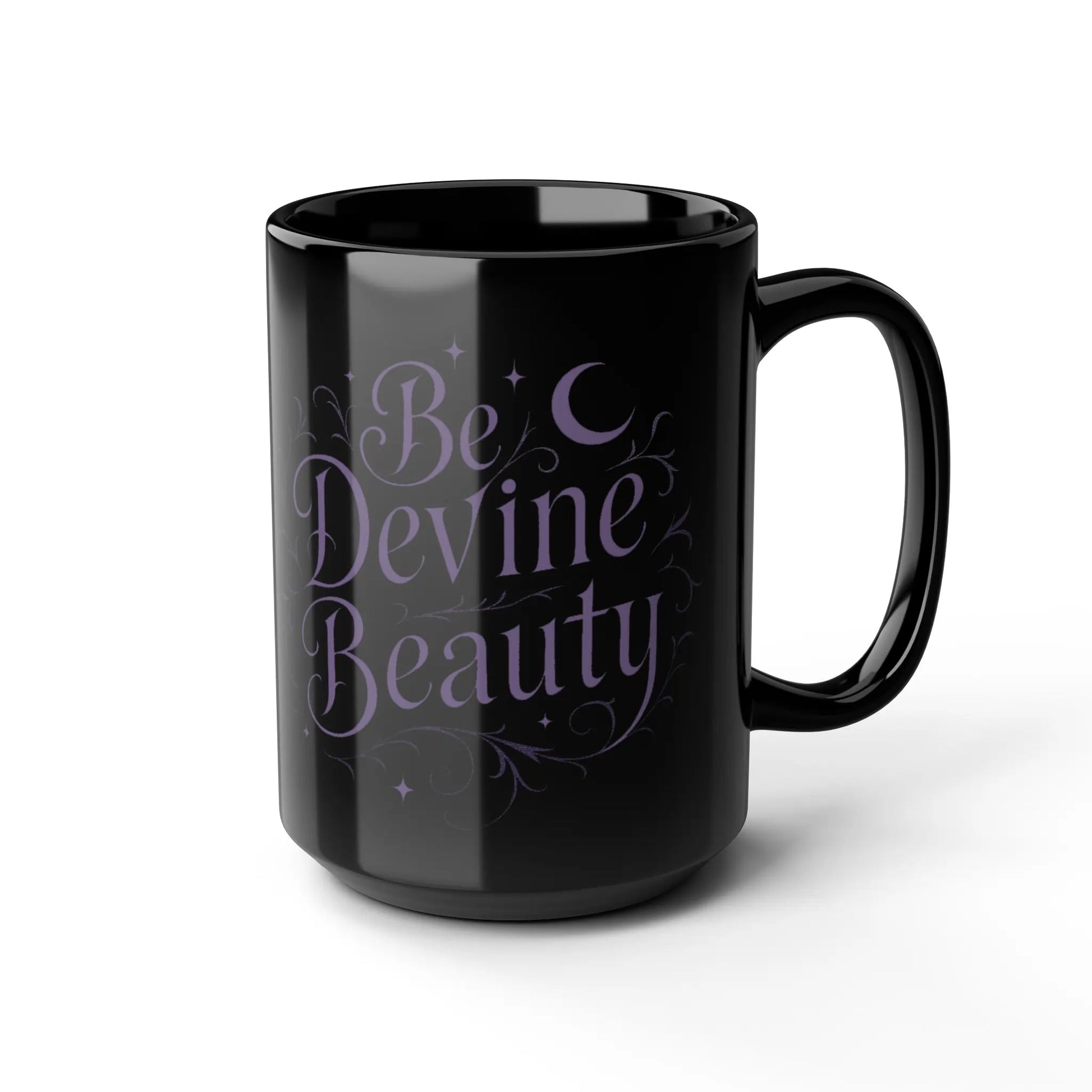 Black mug with 'Be Devine Beauty' text on a white background
