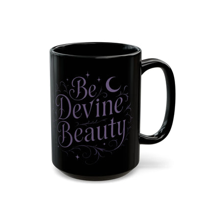 Black mug with 'Be Devine Beauty' text on a white background