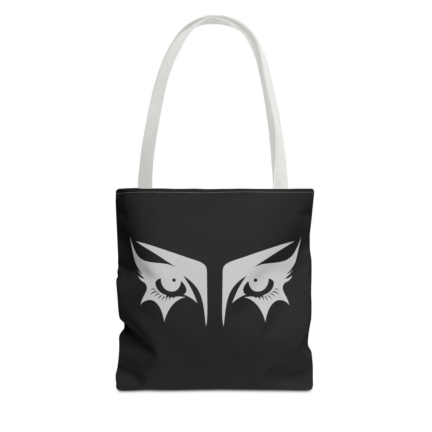 A gothic tote bag that has an illustration of trad goth makeup against a black background.